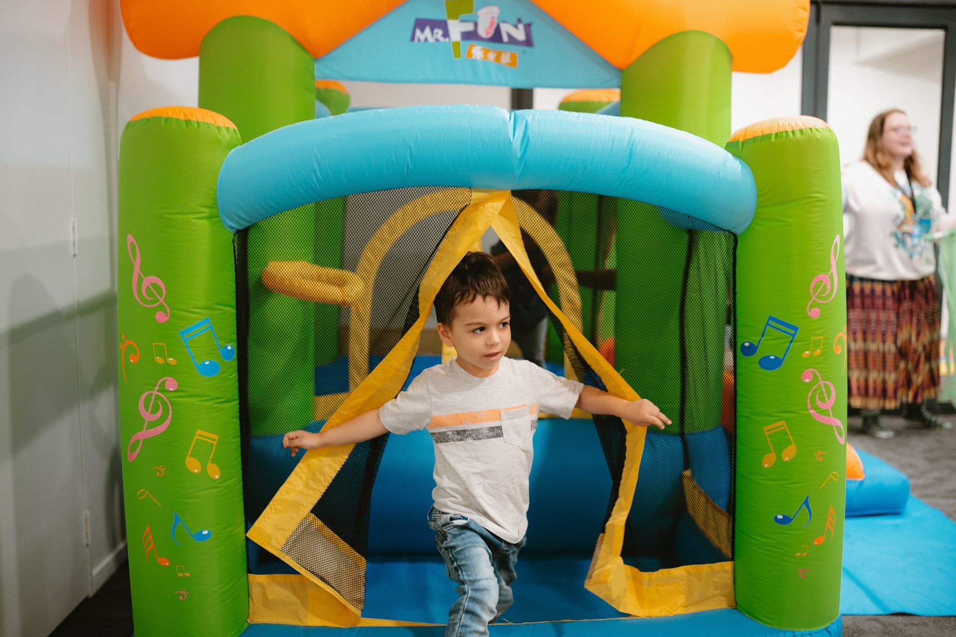 Friends laughing together at Ev Church Auckland community